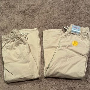 2 pairs of cat & Jack kahki pants. Boys size 8.